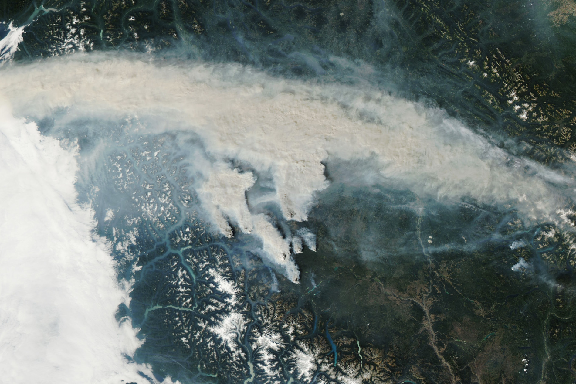 Satellite image showing smoke rising from multiple wildfires in the Cariboo region of British Columbia, captured September 2, 2025.